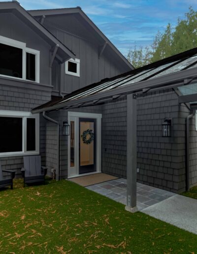 A modern two-story gray house with white-trimmed windows, a glass-covered entryway, two black chairs, and a well-kept yard surrounded by trees and a wooden fence.